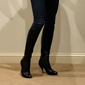 Black leather stiletto knee-high boots